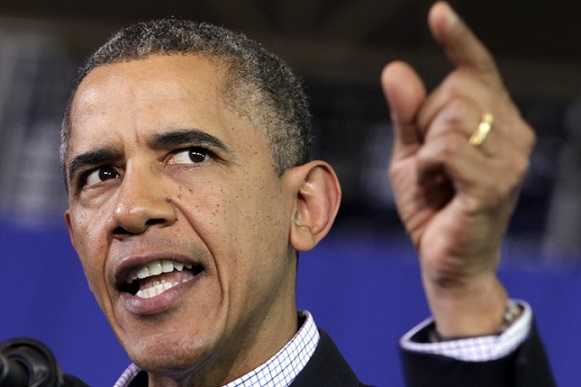 U.S. President Barack Obama delivers remarks at a campaign event for Terry McAuliffe for Governor in Arlington, Virginia, November 3, 2013. REUTERS/Yuri Gripas (UNITED STATES - Tags: POLITICS) - RTX14Z29